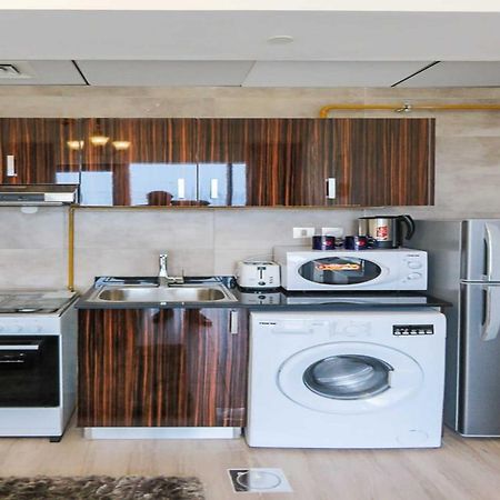 Oyo 860 Studio Apartment, Maya Tower 4, Jumeirah Village Triangle Dubai Exteriör bild