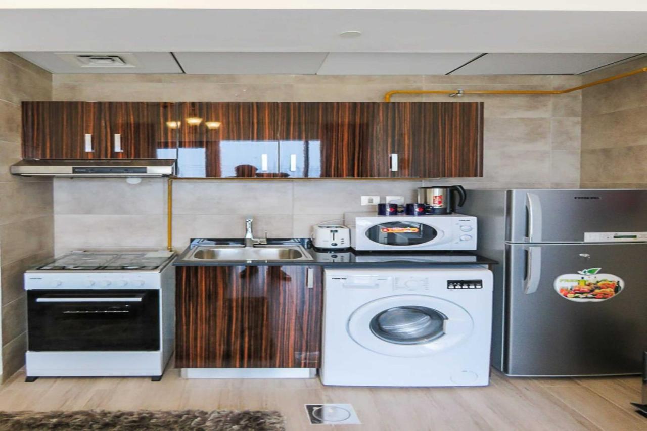Oyo 860 Studio Apartment, Maya Tower 4, Jumeirah Village Triangle Dubai Exteriör bild