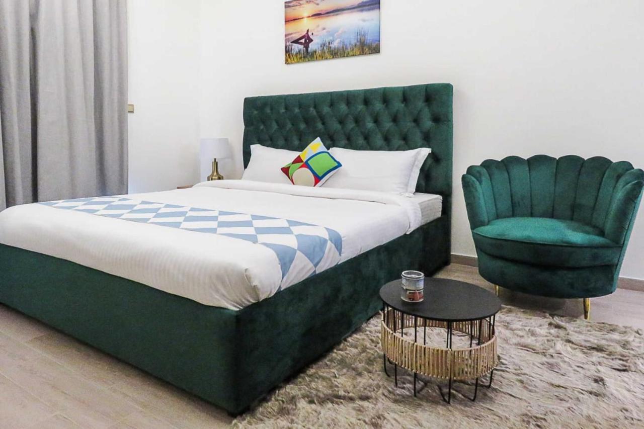 Oyo 860 Studio Apartment, Maya Tower 4, Jumeirah Village Triangle Dubai Exteriör bild