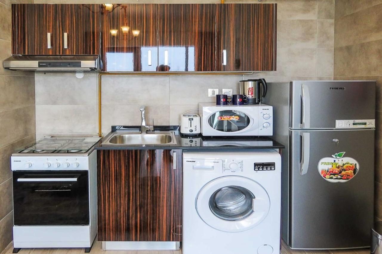 Oyo 860 Studio Apartment, Maya Tower 4, Jumeirah Village Triangle Dubai Exteriör bild