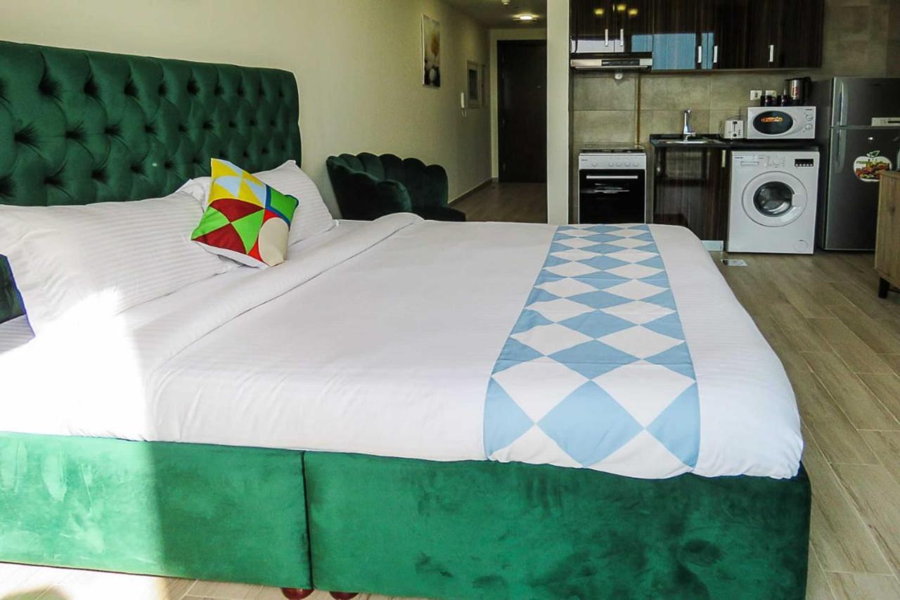 Oyo 860 Studio Apartment, Maya Tower 4, Jumeirah Village Triangle Dubai Exteriör bild
