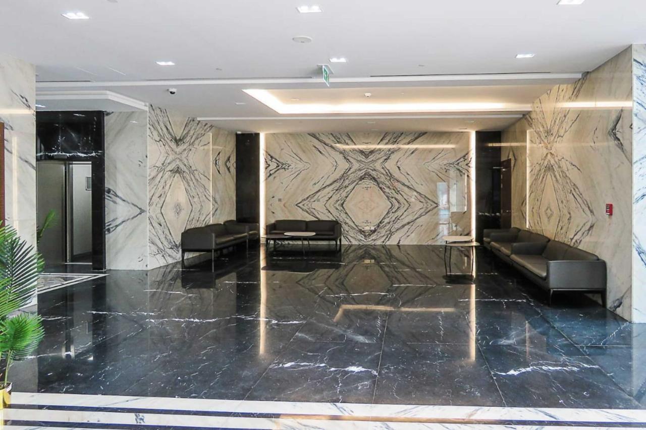 Oyo 860 Studio Apartment, Maya Tower 4, Jumeirah Village Triangle Dubai Exteriör bild